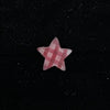 Red checkered star piercing