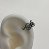 Orb spider piercing