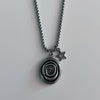 Spiral star necklace