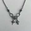 Double chrome cross piercing necklace
