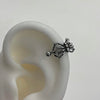 Orb spider piercing