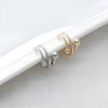 Simple double twist cubic earcuff