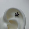 Black flower stud piercing