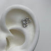 Triple heart sparkle piercing