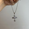 Reversible shiny cross necklace