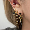 Gold spike black bling cross drop earrings