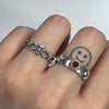 Triple skull sterling silver ring