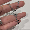 Spike cross cupid heart crown necklace