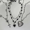 Spike cross cupid heart crown necklace