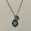 Blue swirl star necklace