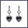 Black heart drop earrings