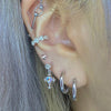 Holographic cross rhinestone piercing