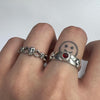 Triple skull sterling silver ring