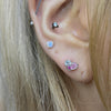 Multiple pink heart piercing